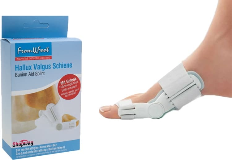 une attelle orthopédique blanche et beige en plastique articulée