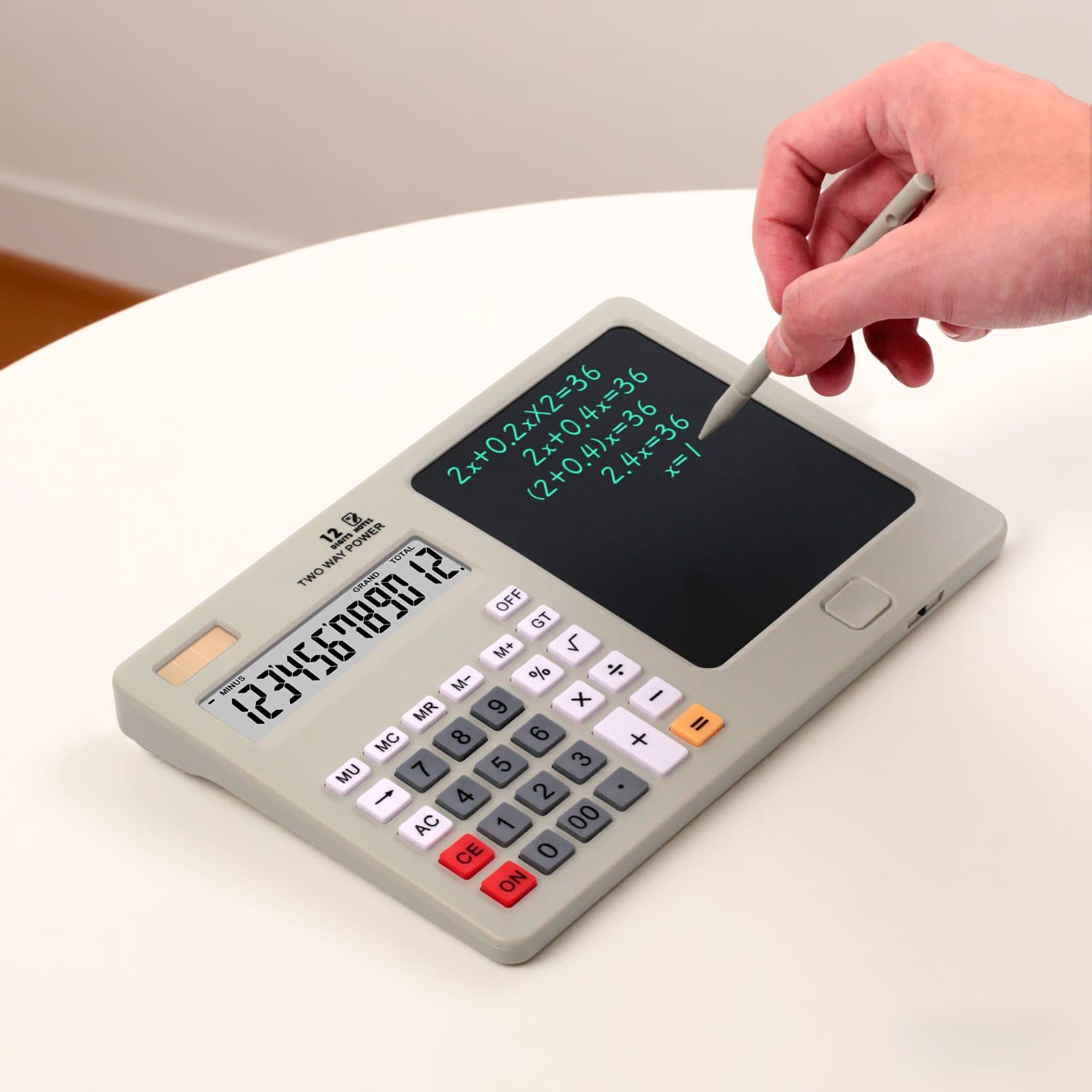 une calculatrice 12 chiffres RONBON DS-80 combinée à une tablette d'écriture LCD